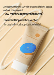 ProtoClinical k-beauty 12GRABS Vegan Comforting Sun 50ml single beige sunscreen package centered upright on a peach-toned background.