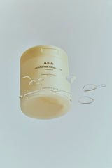 ProtoClinical k-beauty pale blue vertical beauty product with a soft beige center on a light background.