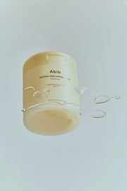 ProtoClinical k-beauty pale blue vertical beauty product with a soft beige center on a light background.