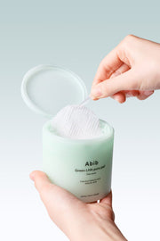 ProtoClinical k-beauty slim beige beauty product on a white background with pale blue side accents.