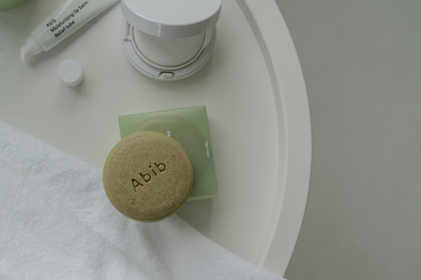 ProtoClinical k-beauty Abib Calming facial soap 100g single green facial soap bar centered on a pale background.