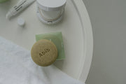 ProtoClinical k-beauty Abib Calming facial soap 100g single green facial soap bar centered on a pale background.