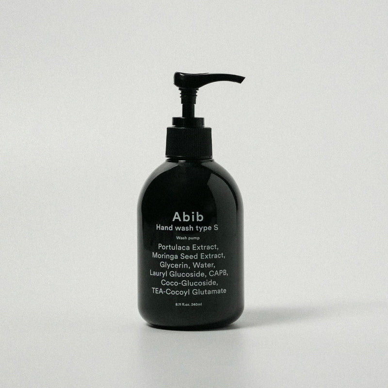 ProtoClinical k-beauty dark vertical beauty product with pale beige side highlights on a white background.