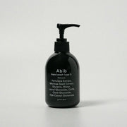 ProtoClinical k-beauty dark vertical beauty product with pale beige side highlights on a white background.