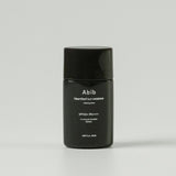 ProtoClinical k-beauty Abib Heartleaf sun essence Calming drop 50ml (SPF50+ PA++++) single upright dark sun essence package centered on a light background.
