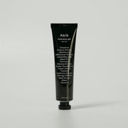 ProtoClinical k-beauty dark vertical beauty product on a white background.