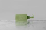 ProtoClinical k-beauty muted olive green beauty graphic with pale gray edges on a light background.