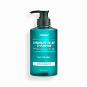 ProtoClinical k-beauty KUNDAL DANDRUFF RELIEF SHAMPOO Pro-Deep Cleansing for Dry Scalp 500ml #APPLE GREENTEA single upright teal shampoo bottle centered on a pale pink and white background.