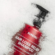 ProtoClinical k-beauty KUNDAL HAIR LOSS RELIEF SHAMPOO Intensive Scalp Care with Caffeine 500ml #WHITE MUSK single upright deep rose shampoo bottle centered on a light background with pale mint side accents.