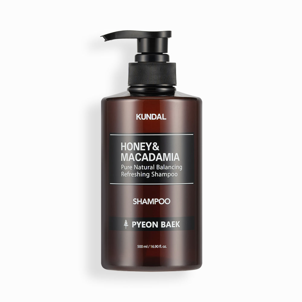 ProtoClinical k-beauty KUNDAL HONEY&MACADAMIA Pure Natural Balancing Refreshing Shampoo 500ml #PYEON BAEK single centered dark shampoo bottle on a white background with pale green side accents.