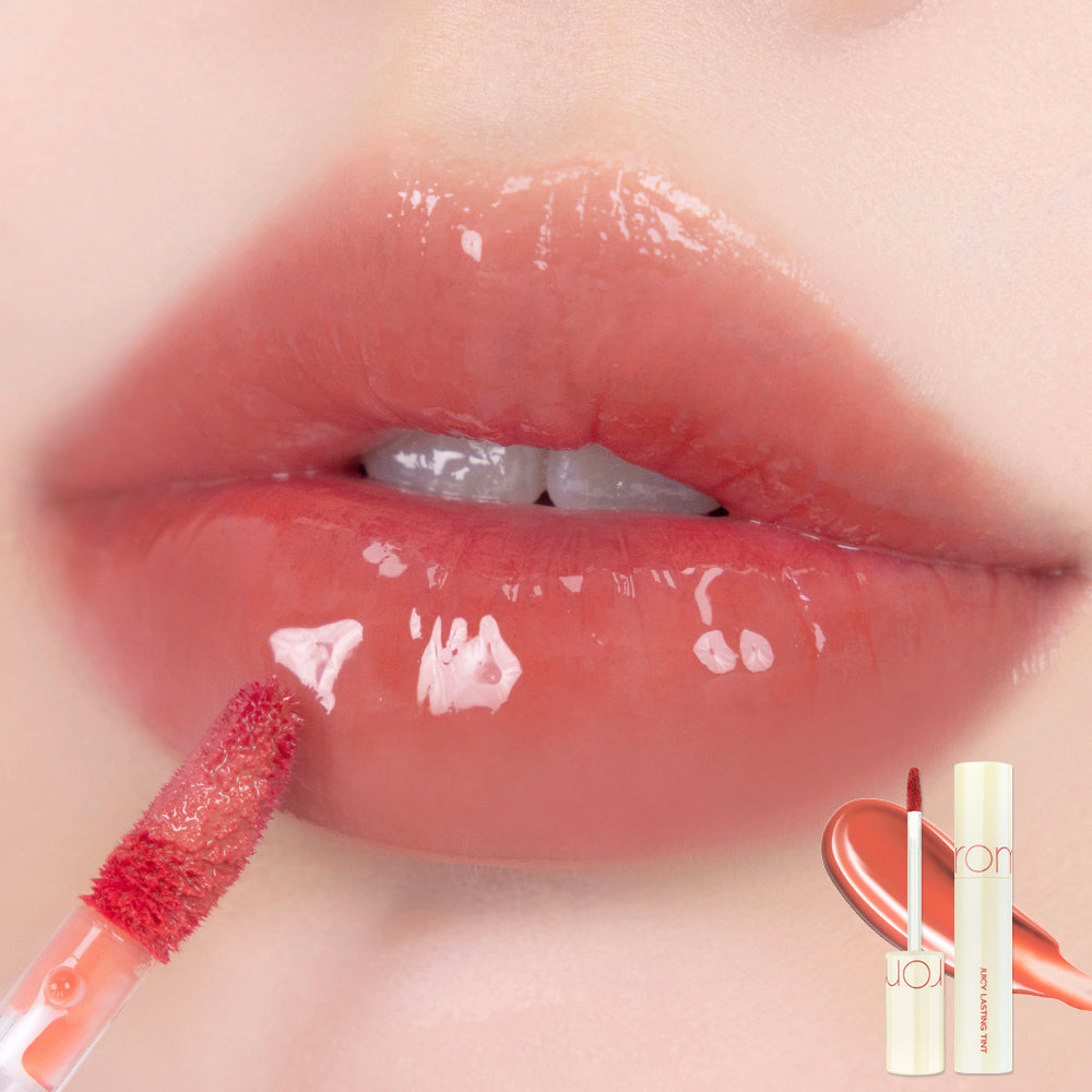 ProtoClinical k-beauty rom&nd JUICY LASTING TINT Milk Grocery Series 28 BARE FIG 29 PAPAYA JAM shade 29 Papaya Jam shown as a close-up lip swatch on model lips with a soft glossy finish