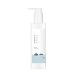 Round Lab 1025 Dokdo Cleansing Milk 200ml by ProtoClinical shown in a front-facing cleansing milk bottle on a light background for a k-beauty skincare routine.