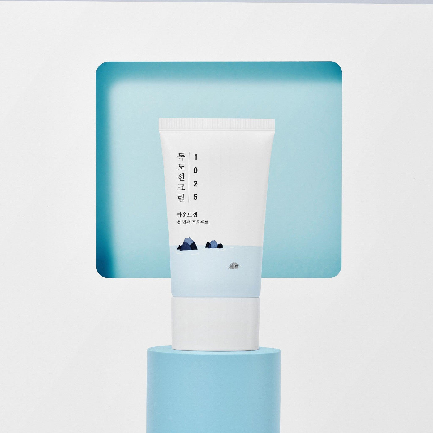 ProtoClinical k-beauty Round Lab 1025 Dokdo Sunscreen 50ml (SPF 50+ PA++++) single sunscreen tube on a light background