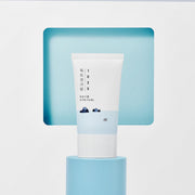 ProtoClinical k-beauty Round Lab 1025 Dokdo Sunscreen 50ml (SPF 50+ PA++++) single sunscreen tube on a light background