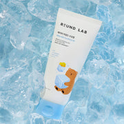 ProtoClinical k-beauty Round Lab Baby Mild Soothing Gel 150ml light blue product silhouette with a muted tan center on a pale background