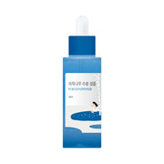 ProtoClinical k-beauty dark teal beauty product silhouette with soft pink side accents on a white background.
