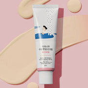 ProtoClinical k-beauty Round Lab Birch Juice Moisturizing Tone Up Sunscreen 50ml (SPF 50+ PA++++) single white sunscreen tube standing upright on a pink background with beige cream swatches