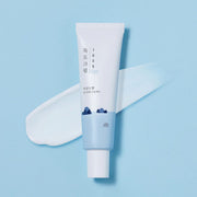 ProtoClinical k-beauty Round Lab Dokdo Eye Cream 30ml single upright light blue eye cream package on a pale background