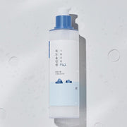 ProtoClinical k-beauty Round Lab For Men 1025 Dokdo All in One Fluid 200ml cool gray product packaging on a light background