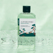 ProtoClinical k-beauty muted teal beauty product silhouette on a pale mint background.