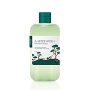 ProtoClinical k-beauty pale green beauty product silhouette with soft peach side accents on a white background.