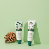 ProtoClinical k-beauty abstract beauty graphic with soft green bands and a darker green lower-left accent.