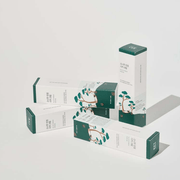 ProtoClinical k-beauty abstract beauty graphic with a dark gray center and soft cream tones on a light background.