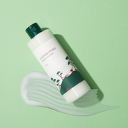 ProtoClinical k-beauty abstract beauty graphic with mint green tones and a soft gray center on a light background.