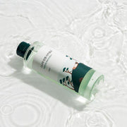 ProtoClinical k-beauty Round Lab Pine Calming Cica Toner 250ml graphic with light gray tones and a soft charcoal center on a pale background.