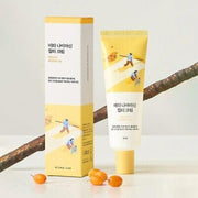 ProtoClinical k-beauty Round Lab Vita Niacin Blemish Cream 50ml packaging silhouette with a vivid aqua vertical center on a light background.
