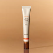ProtoClinical k-beauty goodal Black Carrot Vita-A Retinol Eye Cream 30ml as a single upright ivory eye cream tube with a copper-toned base on a warm beige background