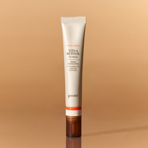 ProtoClinical k-beauty goodal Black Carrot Vita-A Retinol Eye Cream 30ml as a single upright ivory eye cream tube with a copper-toned base on a warm beige background