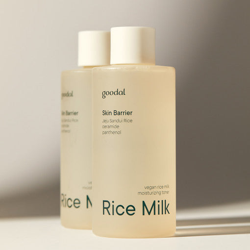ProtoClinical k-beauty goodal Vegan Rice Milk Moisturizing Toner 250ml single upright pale cream toner bottle centered on a warm beige background with soft brown side shading