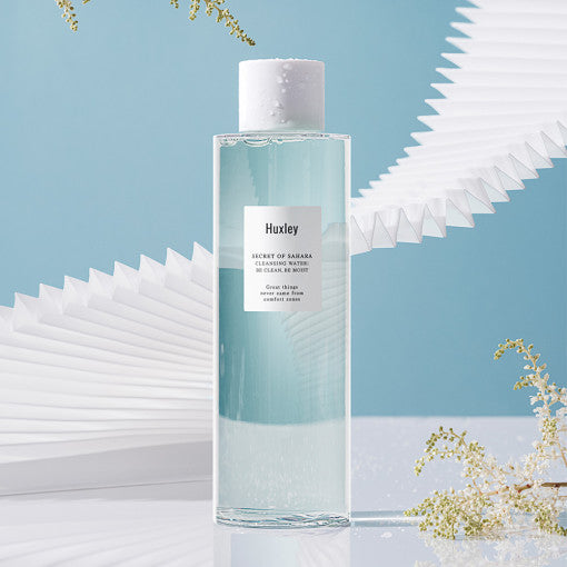 ProtoClinical k-beauty soft blue beauty graphic with darker diagonal shading and pale lower accents.