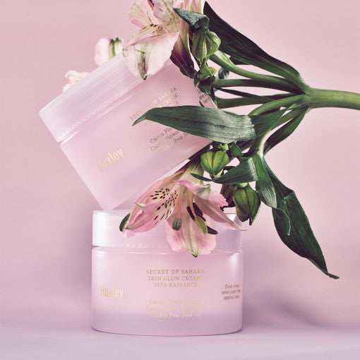 ProtoClinical k-beauty Huxley Skin Glow Cream Vita Radiance 50ml shown as a mauve and taupe product graphic on a soft neutral background