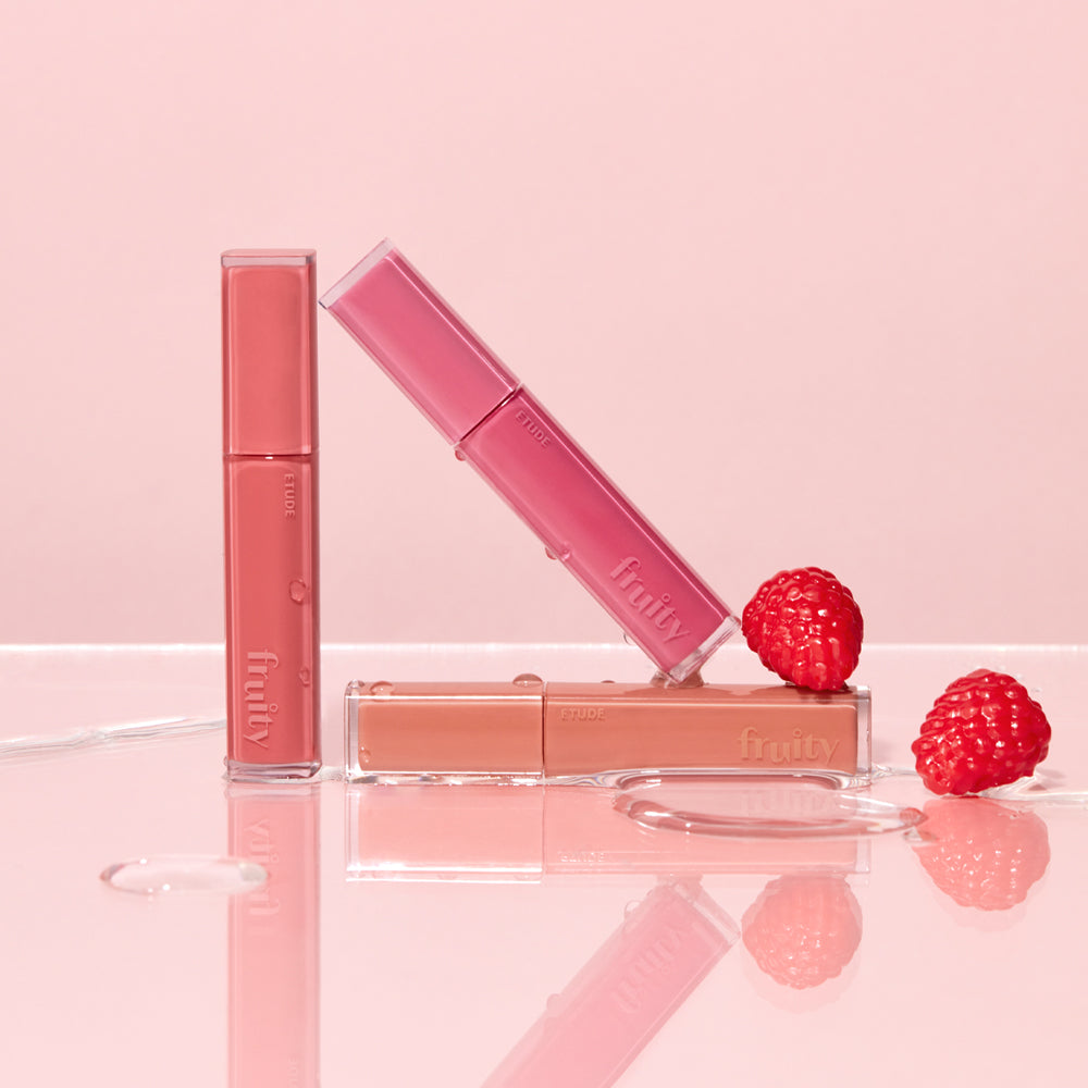 ProtoClinical k-beauty ETUDE Fruity Dewy Tint 4.5g soft rosy lip tint swatch in a wide square shape with blurred edges on a pale blue and white background