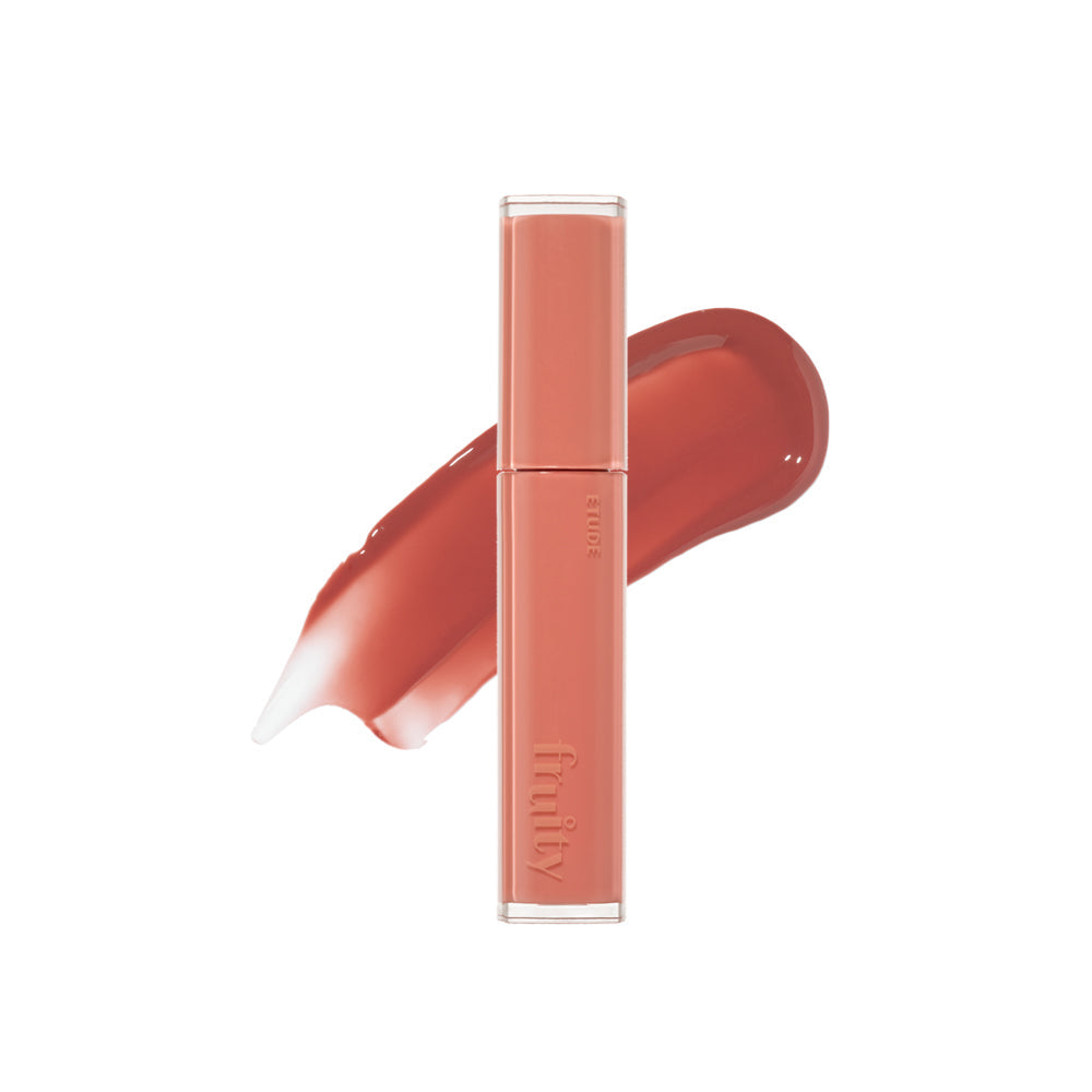 ProtoClinical k-beauty ETUDE Fruity Dewy Tint 4.5g muted fig-pink lip tint swatch in a wide square shape with blurred edges on a pale blue and white background