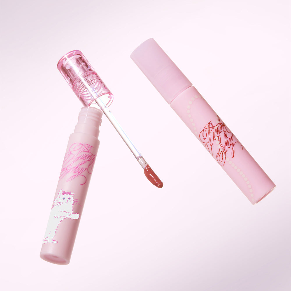 ProtoClinical k-beauty ETUDE Pink Shy Fixing Tint 4g soft rosy lip tint swatch in a wide square shape with blurred edges on a pale blue and white background