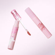 ProtoClinical k-beauty ETUDE Pink Shy Fixing Tint 4g soft rosy lip tint swatch in a wide square shape with blurred edges on a pale blue and white background