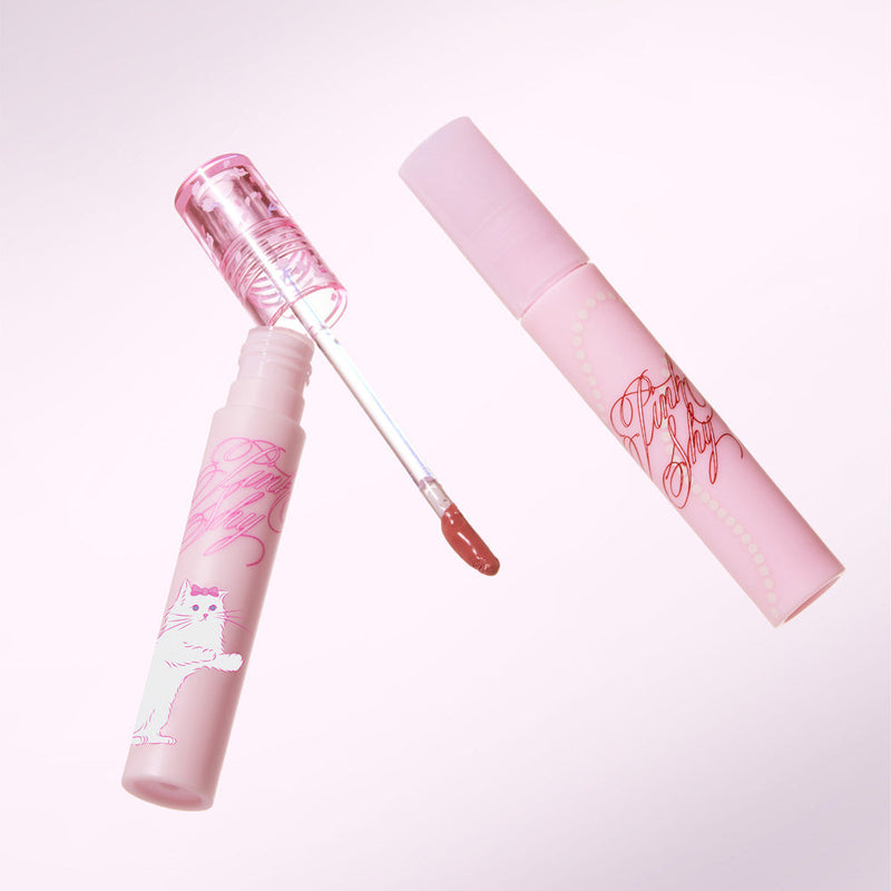 ProtoClinical k-beauty ETUDE Pink Shy Fixing Tint 4g soft rosy lip tint swatch in a wide square shape with blurred edges on a pale blue and white background