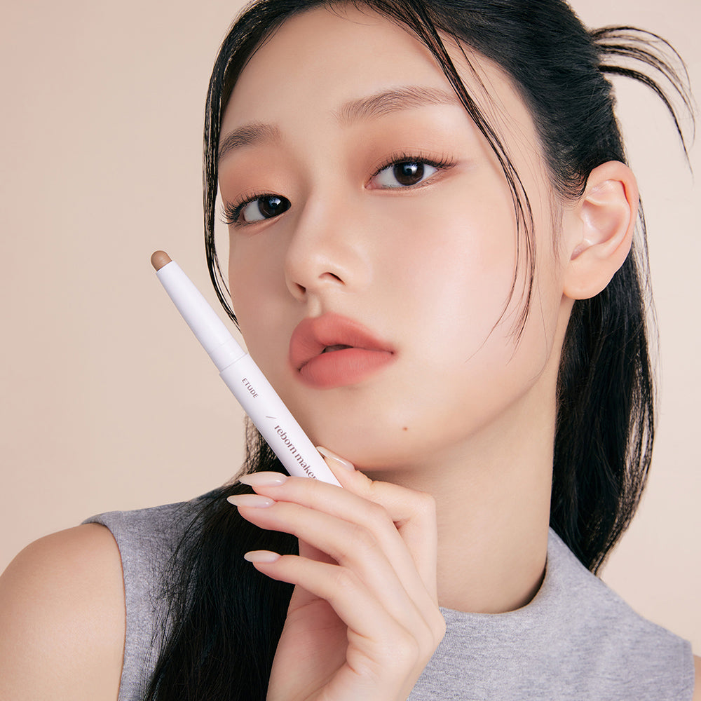 ProtoClinical k-beauty ETUDE Reborn Maker Over Lip 1g single upright lip product in warm beige and rosy tones centered on a light background with dark side shading