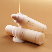 ProtoClinical k-beauty NATURE REPUBLIC Snail Solution Emulsion 120ml abstract beauty graphic with a warm tan body and a darker brown horizontal band near the bottom.