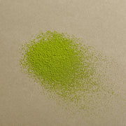 ProtoClinical k-beauty OSULLOC Organic Premium Matcha Powder 40g round olive label centered on a muted lavender background.