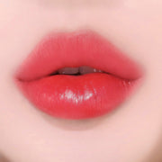 ProtoClinical k-beauty WAKEMAKE Watery Tok Tint square tint shade graphic with coral-rose panels, soft glossy blocks, and a light background