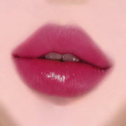 ProtoClinical k-beauty WAKEMAKE Watery Tok Tint square tint shade graphic with deeper berry-pink panels, glossy color blocks, and a light background