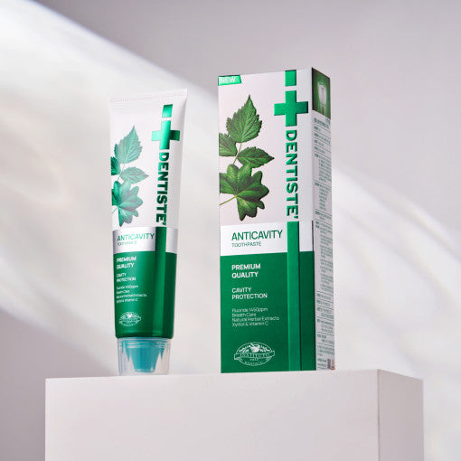 ProtoClinical k-beauty DENTISTE Anti-Cavity Toothpaste 100g single green toothpaste package centered on a light background.