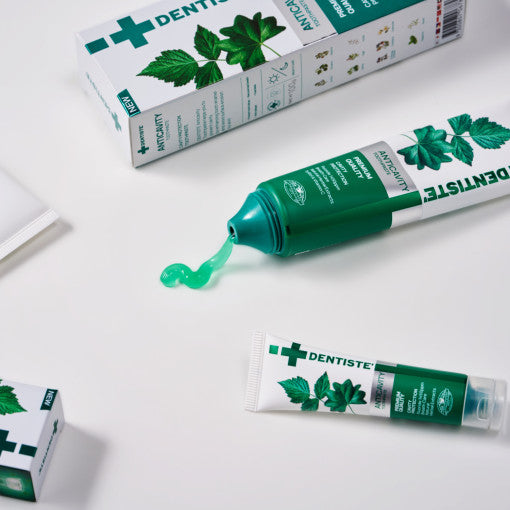 ProtoClinical k-beauty DENTISTE Anti-Cavity Toothpaste 100g single green toothpaste package centered on a light background.
