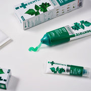 ProtoClinical k-beauty DENTISTE Anti-Cavity Toothpaste 100g single green toothpaste package centered on a light background.