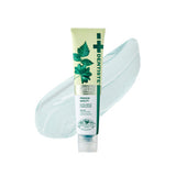 ProtoClinical k-beauty DENTISTE Mild Toothpaste 60g single upright blue toothpaste tube centered on a white background with soft peach side accents.
