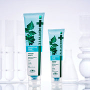 ProtoClinical k-beauty DENTISTE Sensitive Care Toothpaste 60g single upright blue toothpaste tube centered on a white background with soft pink side accents.